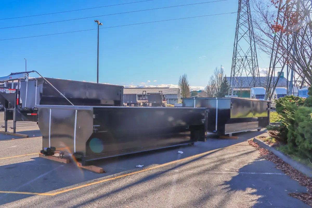 Roll-off dumpster ready for waste disposal at job site for 2 Yard Dumpster Rental in Clarks Summit